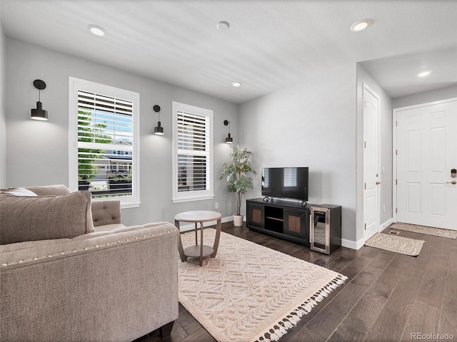 14565 Vancouver Pl, Parker, CO 80134 - living area with dark wood-style flooring and recessed lighting