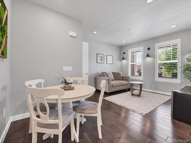 14565 Vancouver Pl, Parker, CO 80134 - dining space with recessed lighting and dark wood-type flooring