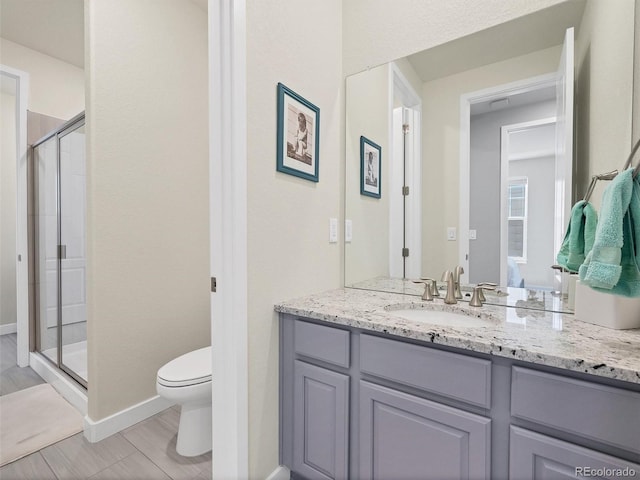 14565 Vancouver Pl, Parker, CO 80134 - bathroom featuring a shower stall and vanity
