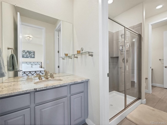 14565 Vancouver Pl, Parker, CO 80134 - bathroom with a stall shower, ensuite bath, and vanity