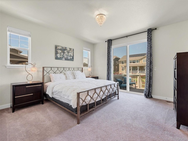 14565 Vancouver Pl, Parker, CO 80134 - bedroom featuring access to outside and carpet flooring