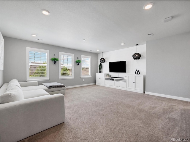14565 Vancouver Pl, Parker, CO 80134 - carpeted living room with baseboards and recessed lighting