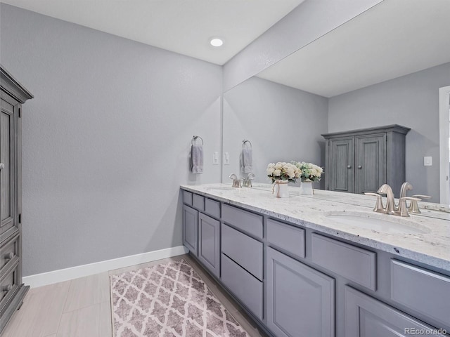 14565 Vancouver Pl, Parker, CO 80134 - full bathroom with double vanity and baseboards