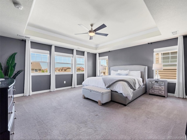14565 Vancouver Pl, Parker, CO 80134 - bedroom featuring a raised ceiling, carpet flooring, crown molding, and ceiling fan