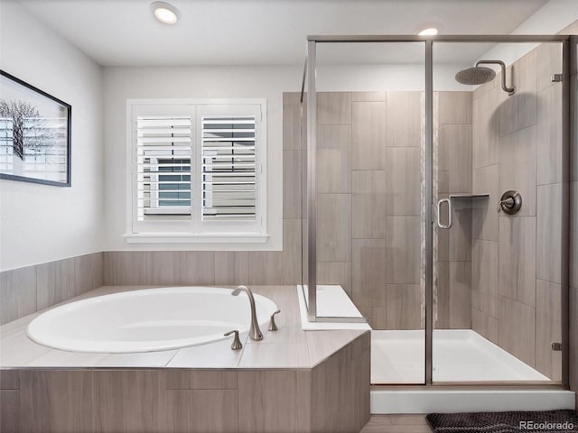14565 Vancouver Pl, Parker, CO 80134 - full bathroom with a bath, a shower stall, and recessed lighting