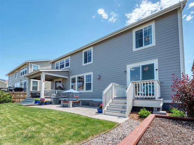 14565 Vancouver Pl, Parker, CO 80134 - rear view of property featuring a yard and a patio