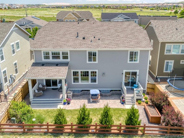 14565 Vancouver Pl, Parker, CO 80134 - rear view of house with a fenced backyard, a patio, a shingled roof, a residential view, and a deck
