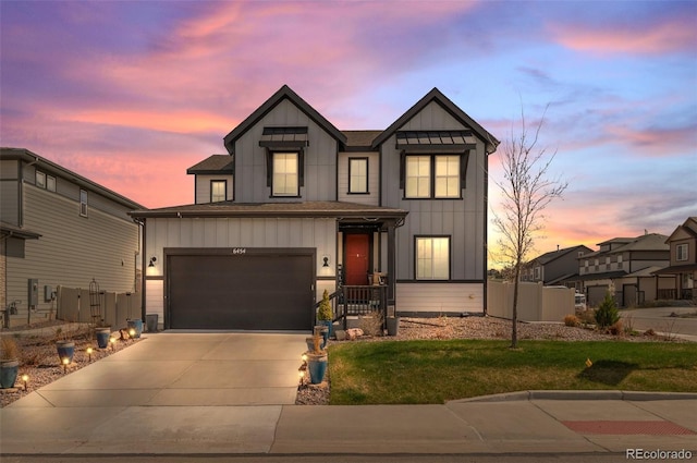 6454 Leathers Ln, Parker, CO 80134 - view of front of property featuring board and batten siding and concrete driveway