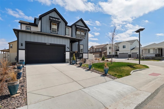 6454 Leathers Ln, Parker, CO 80134 - view of front of house featuring board and batten siding, a residential view, concrete driveway, and an attached garage