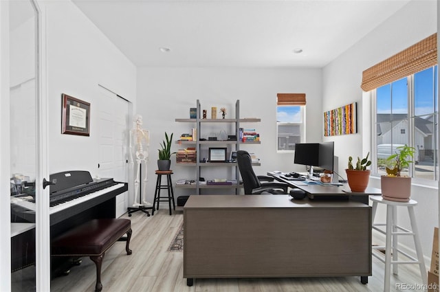 6454 Leathers Ln, Parker, CO 80134 - office area with healthy amount of natural light, wood finished floors, and recessed lighting
