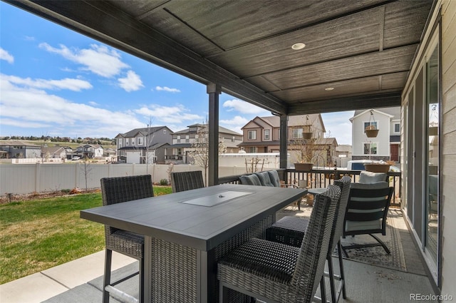 6454 Leathers Ln, Parker, CO 80134 - fenced backyard with a residential view, outdoor dining space, and a patio area