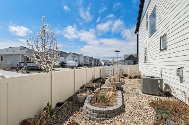 6454 Leathers Ln, Parker, CO 80134 - fenced backyard with a residential view and a vegetable garden