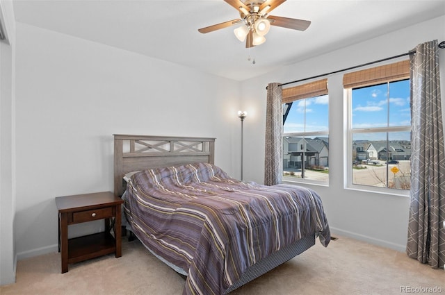 6454 Leathers Ln, Parker, CO 80134 - carpeted bedroom with baseboards and a ceiling fan