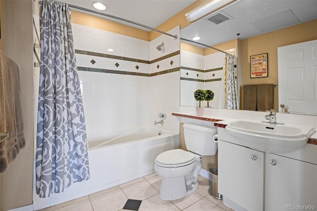 full bathroom with shower / bathtub combination with curtain, vanity, tile patterned floors, and toilet