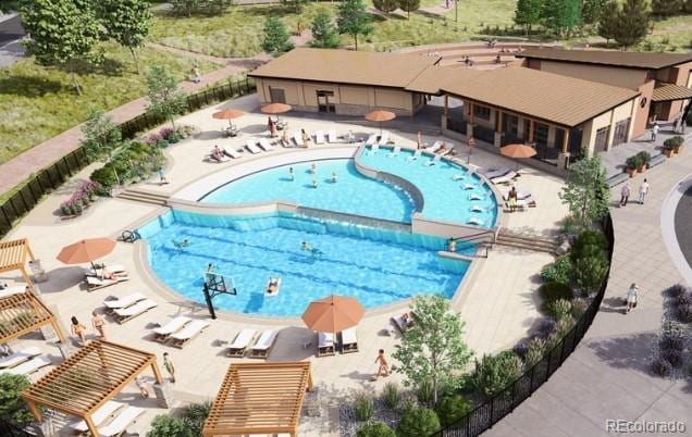 community pool featuring a patio area