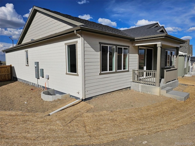 view of home's exterior with a porch