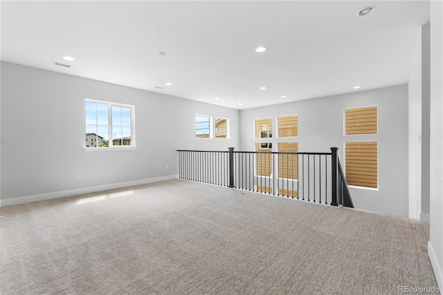 6683 Bridle Creek Pt, Castle Pines, CO 80108 - empty room featuring carpet floors and recessed lighting