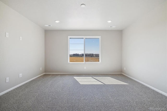 view of carpeted spare room