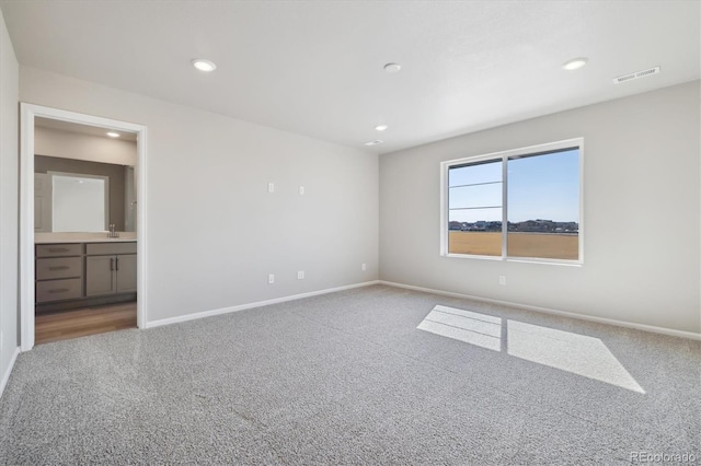 view of carpeted spare room