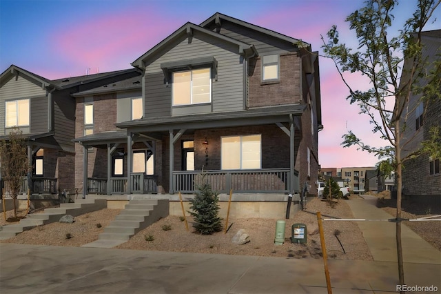 view of front of home featuring covered porch