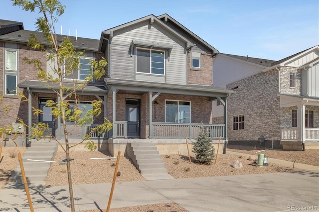 view of front of home featuring covered porch