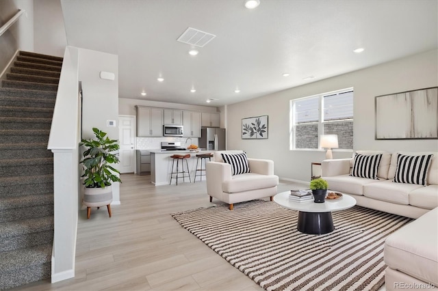 living room featuring light hardwood / wood-style flooring