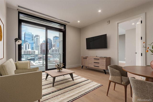 1901 Wazee St Unit 707, Denver, CO 80202 - living area with light wood-style flooring, plenty of natural light, and recessed lighting