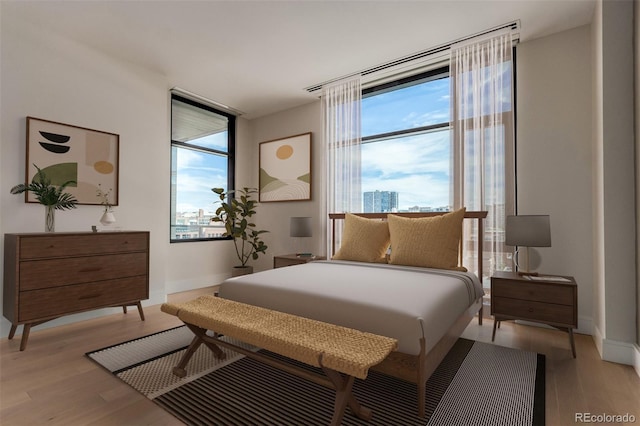 1901 Wazee St Unit 707, Denver, CO 80202 - bedroom featuring light wood finished floors