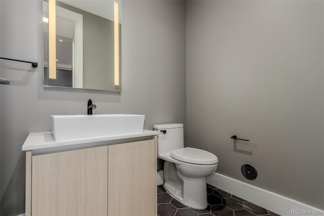 1901 Wazee St Unit 707, Denver, CO 80202 - half bathroom with vanity and tile patterned floors