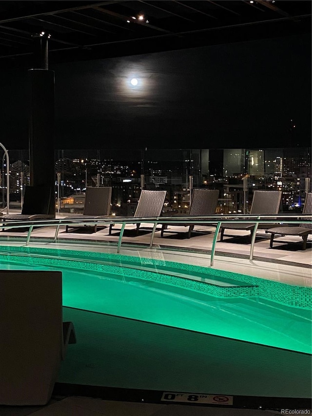 1901 Wazee St Unit 707, Denver, CO 80202 - pool at twilight featuring a view of city lights