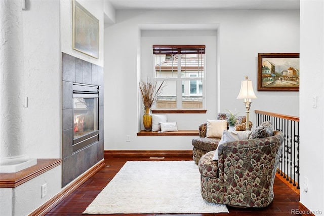 living area featuring dark hardwood / wood-style floors