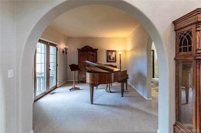 misc room with light carpet and french doors