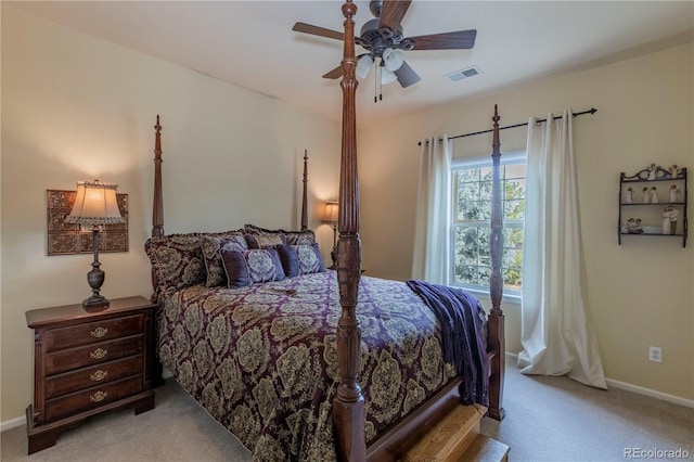 bedroom featuring ceiling fan and light carpet