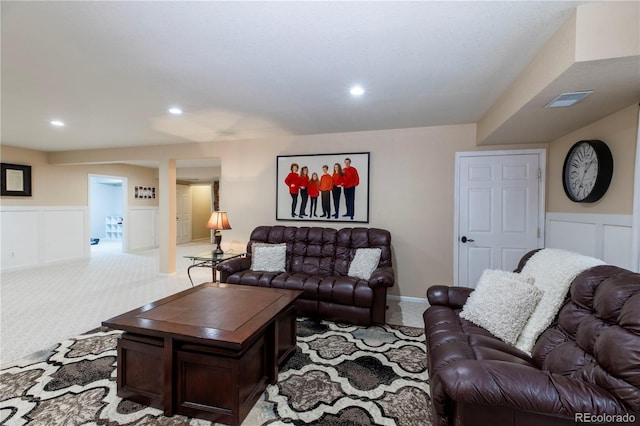 living room featuring light carpet