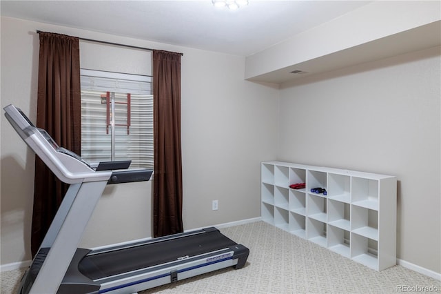 workout area featuring carpet floors