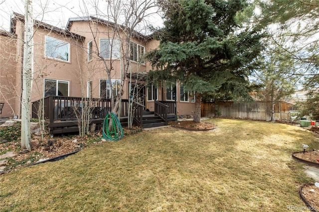 view of yard with a wooden deck