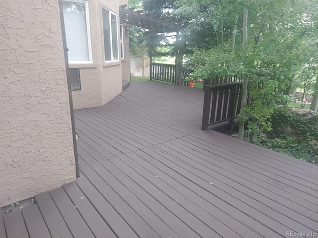 wooden terrace featuring a pergola