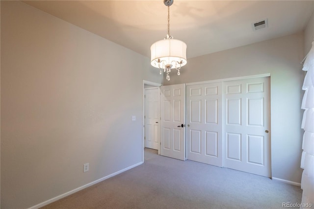 2675 Timberchase Trl, Highlands Ranch, CO 80126 - unfurnished bedroom with carpet floors, baseboards, a chandelier, and a closet