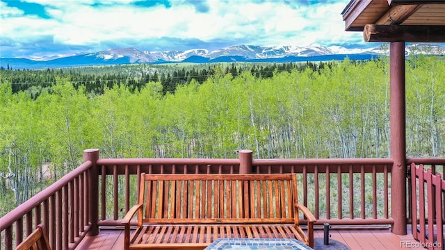 514 Little Baldy Cir, Fairplay, CO 80440 - wooden terrace featuring a mountain view and a wooded view