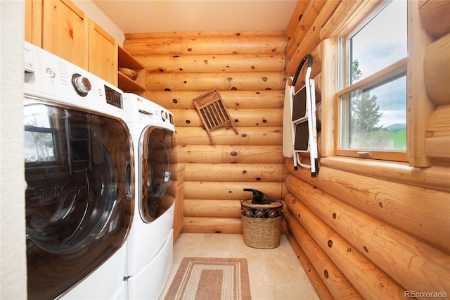 514 Little Baldy Cir, Fairplay, CO 80440 - washroom featuring washer and clothes dryer, rustic walls, and light tile patterned floors