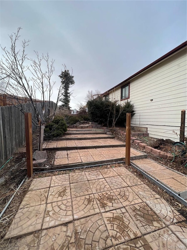 view of patio / terrace with fence