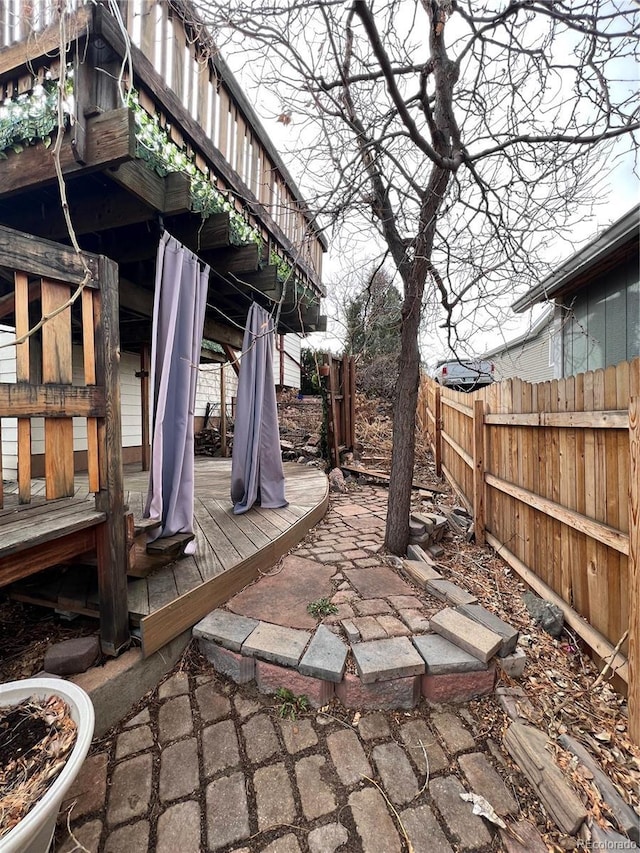 view of yard featuring stairs and fence