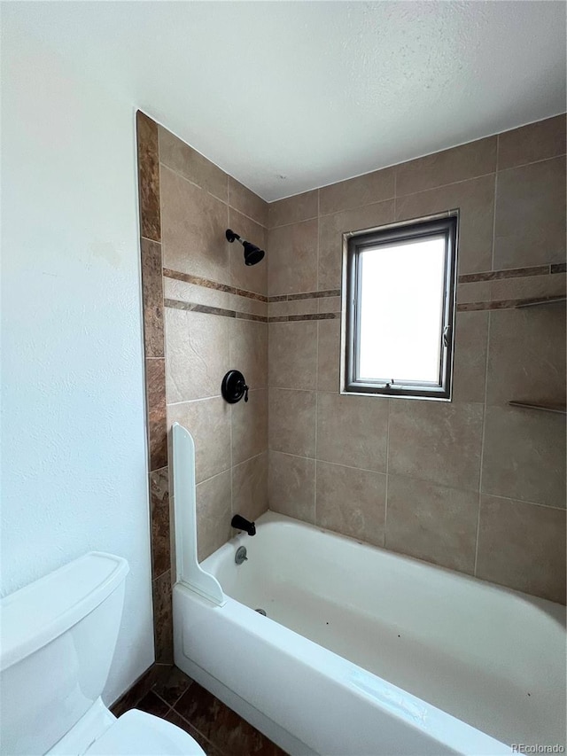 full bath with shower / washtub combination and toilet