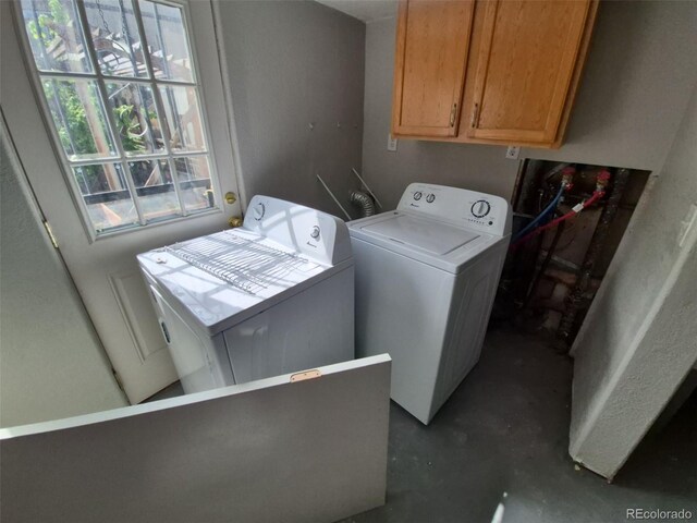 2758 S Salida St, Aurora, CO 80013 - laundry room featuring washing machine and dryer and cabinet space