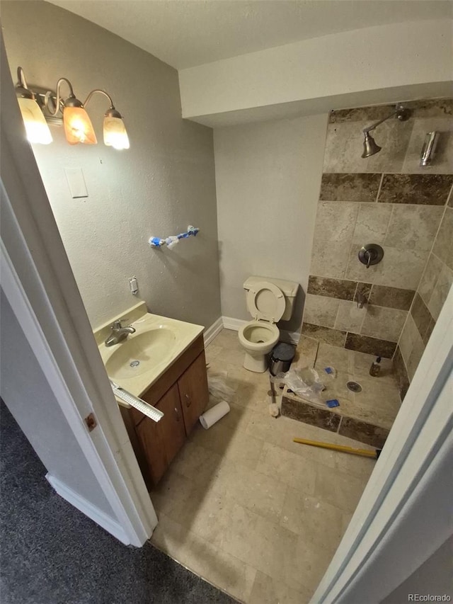 2758 S Salida St, Aurora, CO 80013 - full bathroom featuring vanity, tiled shower, and toilet