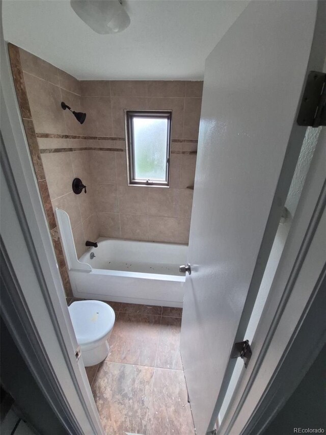 2758 S Salida St, Aurora, CO 80013 - bathroom with toilet,  shower combination, and tile patterned floors