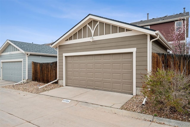 garage featuring fence