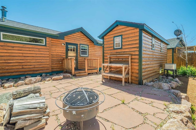 view of patio / terrace featuring a fire pit