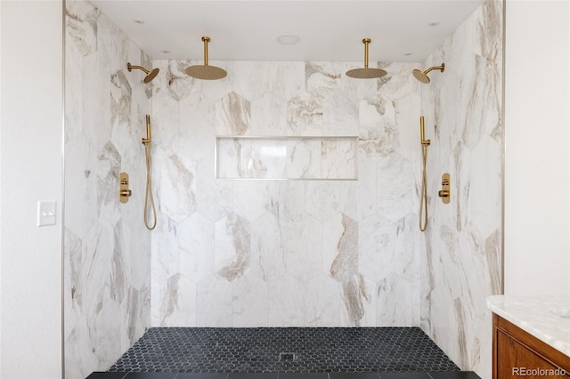 bathroom with a tile shower