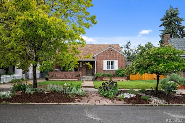 1429 Hudson St, Denver, CO 80220 - view of front of property featuring brick siding